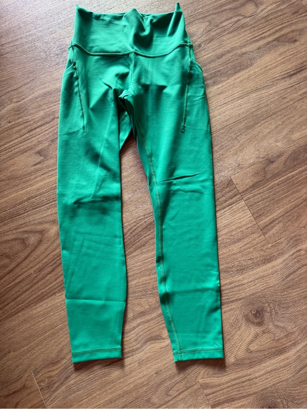 Lululemon Green wunder train high rise tight 25 with pockets